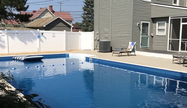 Historic, Spacious, 4 BR, POOL, dog friendly home in town with a gas fire pit .