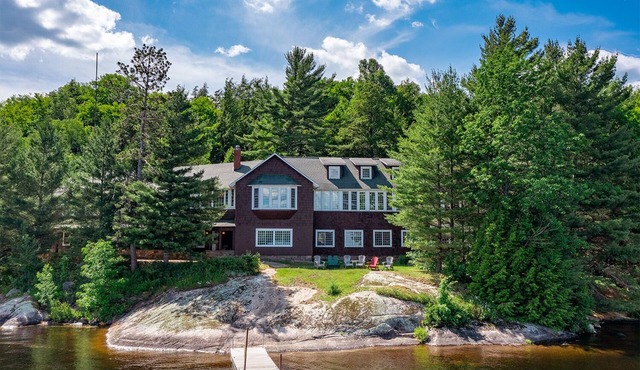 Historic Warren Point Lodge ~ 1,000 Feet Of Beautiful Waterfront on Tupper Lake