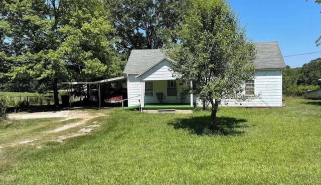 Historical farm house on beautiful pasture land