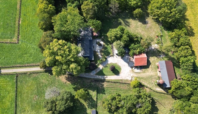 HISTORICAL, UPDATED FARM HOUSE, 15 ACRES, 2 CREEKS & CLOSE TO IT ALL!