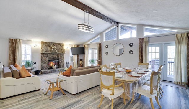 Hit the slopes, hike through scenic trails, or unwind in the hot tub, this home has it all!