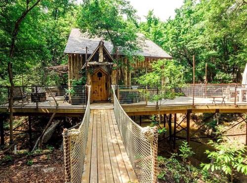 Hobbit Treehouse with Waterfall on the Brazos River for Glamping in Texas