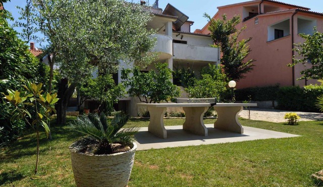 Holiday apartment with air conditioning and balcony