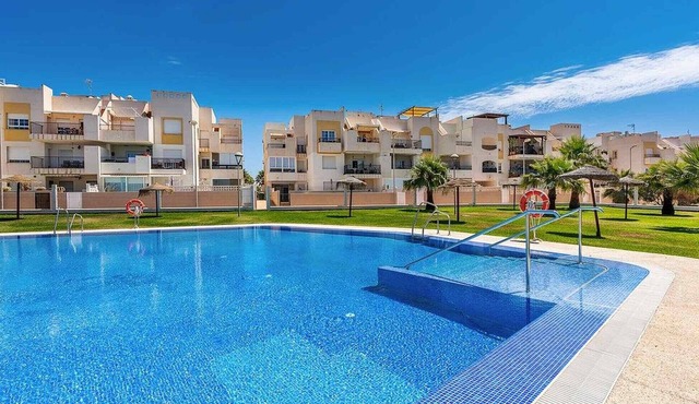 Holiday Apartment "El Toyo" with Shared Pool, Private Terraces & Wi-Fi