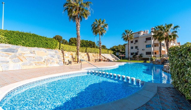 Holiday Apartment "Sunnygolfbeach" with Shared Pool, Terraces & Wi-Fi