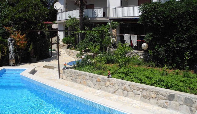 Holiday apartment with outdoor pool just 30 meters from the beach