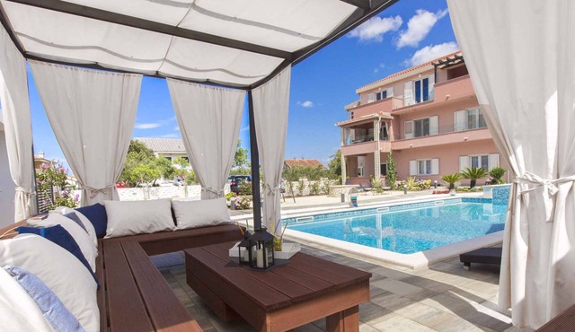Holiday apartment with terrace and pool