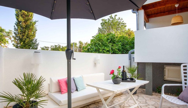 Holiday apartment with terrace and air conditioning