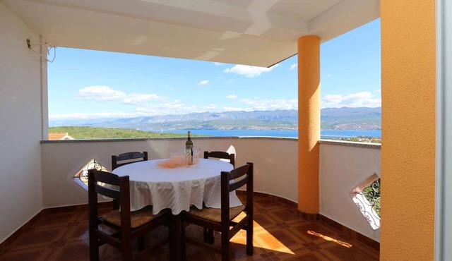 Holiday apartment with balcony and air conditioning