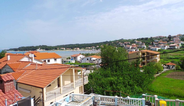 Holiday apartment with air conditioning and sea view