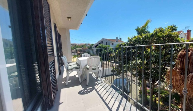 Holiday apartment with air conditioning and balcony