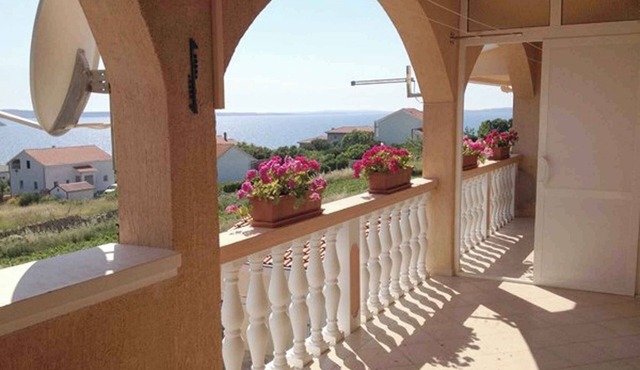 Holiday apartment with air conditioning and balcony