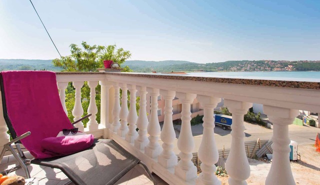 Holiday apartment with balcony and sea view