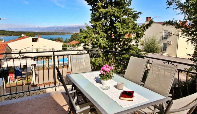 Holiday apartment with balcony and sea view