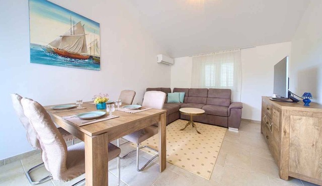 Holiday apartment with balcony and air conditioning