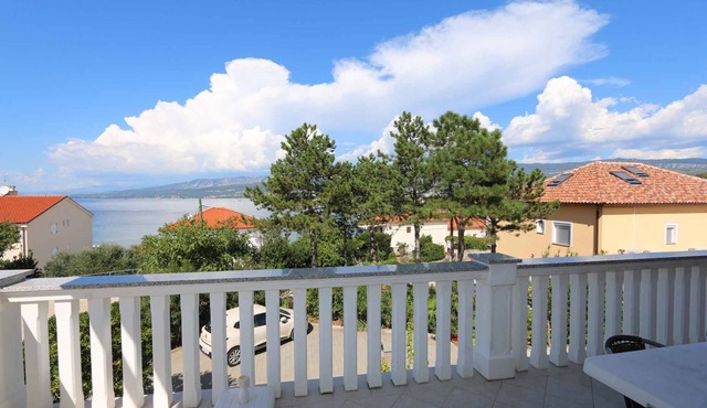Holiday apartment with balcony and sea view