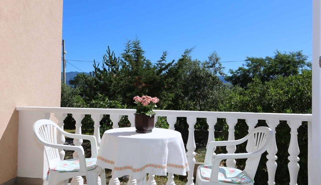Holiday apartment with balcony and air conditioning