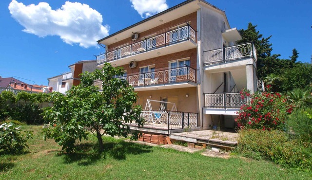 Holiday apartment with balcony and air conditioning