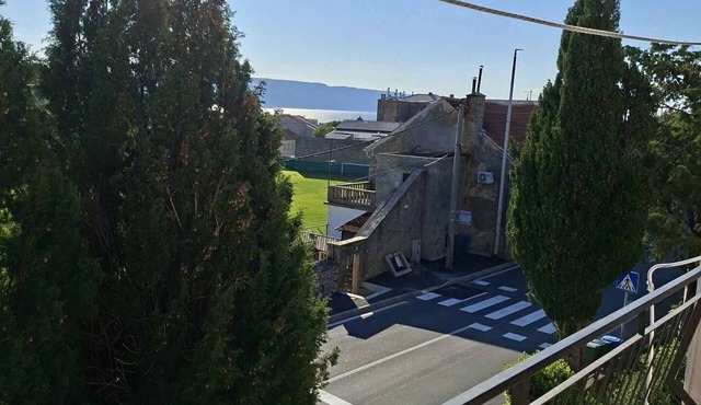Holiday apartment with balcony and sea view