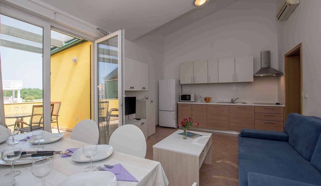Holiday apartment with balcony and air conditioning