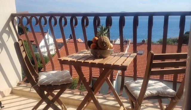Holiday apartment with balcony and sea view