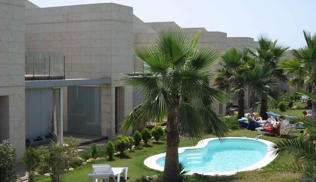 Holiday apartment with a beautiful garden and several small pools