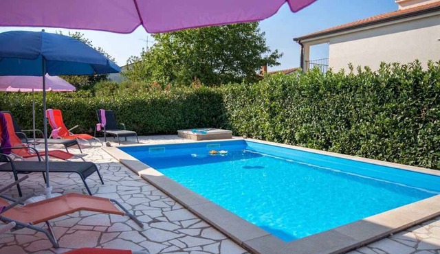 Holiday apartment with use of pool