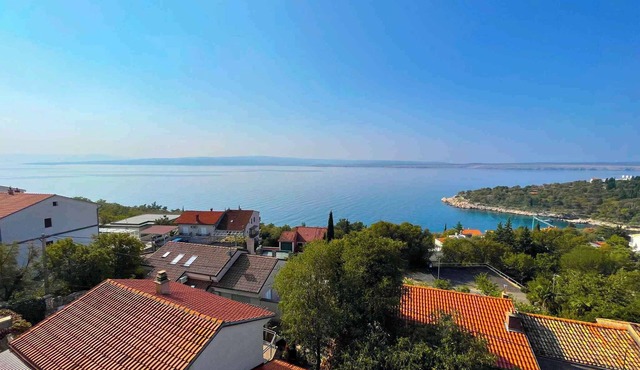 Holiday apartment with balcony and sea view