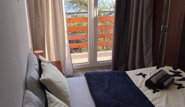 Holiday apartment with balcony and sea view