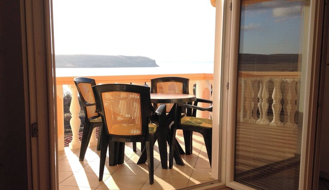 Holiday apartment with air conditioning and sea view