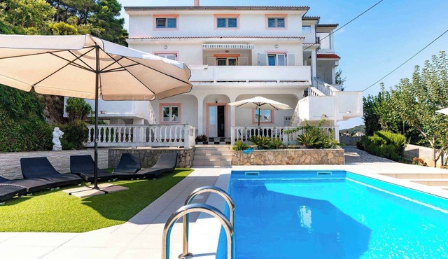 Holiday apartment with large terrace and outdoor pool