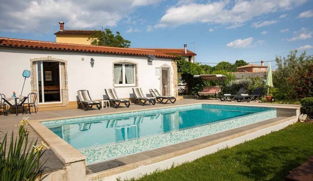 Holiday apartment with outdoor swimming pool and terrace