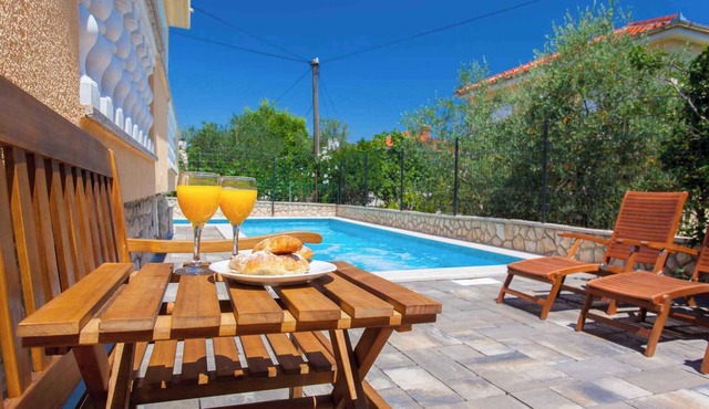 Holiday apartment with outdoor pool
