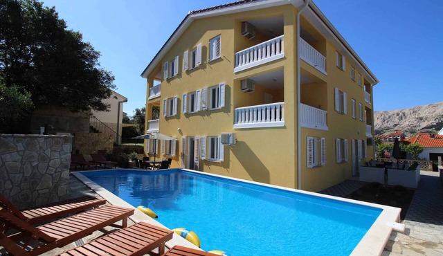 Holiday apartment with pool