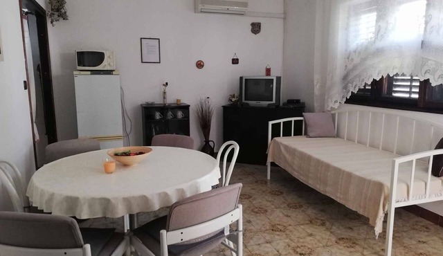Holiday apartment with terrace and air conditioning