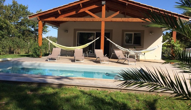 Holiday home with heated swimming pool