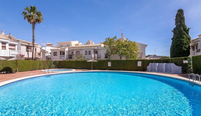 Holiday Home 'Casa en la playa con piscinas 11 A' with Shared Pool, Wi-Fi and Air Conditioning