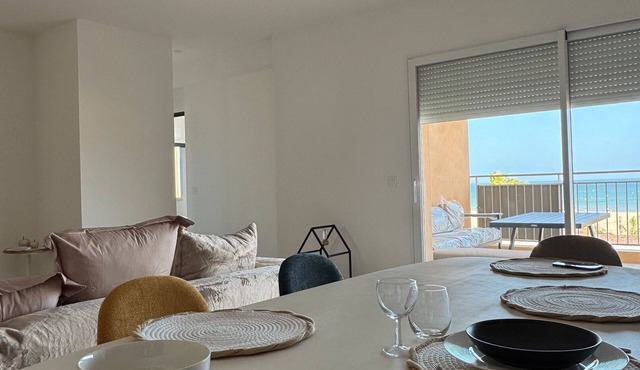 Holiday Home 'Face À La Mer 2' with Private Terrace and Air Conditioning