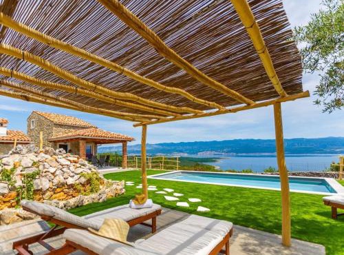Holiday home in Risika with swimming pool