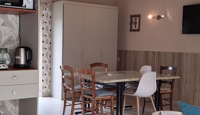 Holiday Home 'La Maisonnette Du Meslay' with Private Terrace, Shared Garden & Wi-Fi