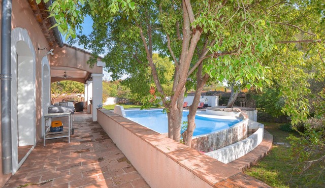 Holiday home near a forest on a large plot with a very large outdoor pool.