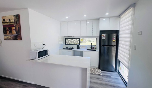 Holiday Home on Acreage Block - Next to M1 and Close to Everything