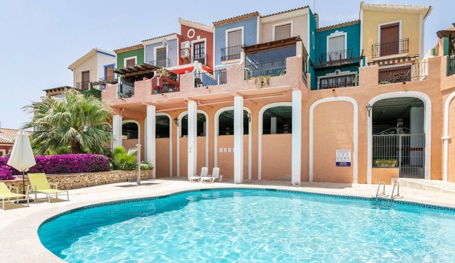 Holiday Home 'Sol de Mar' with Sea and Mountain View, Shared Pool & Wi-Fi