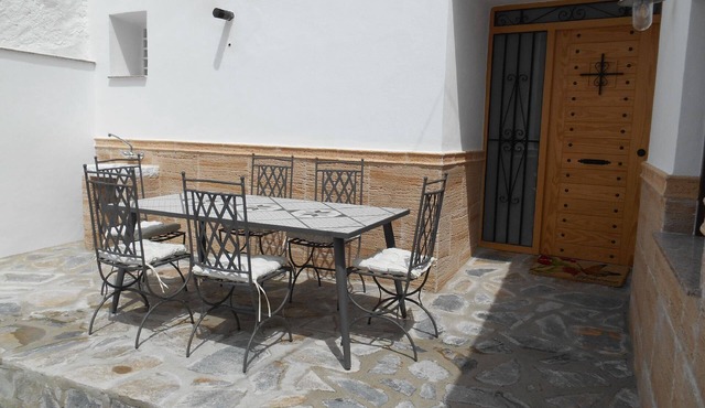 Holiday home with garden and shared pool