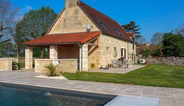Holiday home with a large private heated pool and a beautiful view