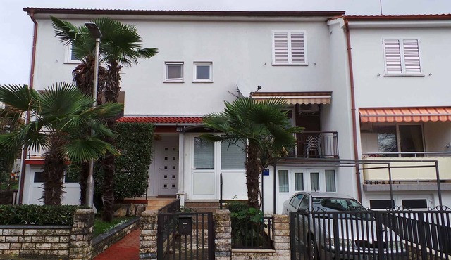 Holiday home with balcony and air conditioning