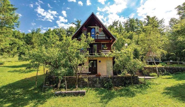 Holiday home with garden and barbecue