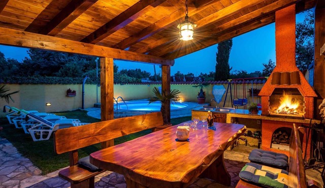 Holiday home with pool, gazebo and children's swings