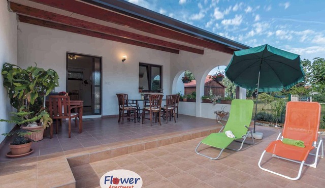 Holiday home with large terrace and air conditioning