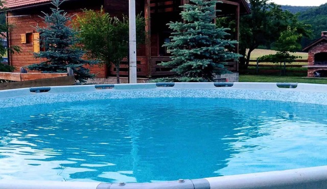 Holiday home with outdoor pool and garden